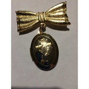 Vintage Goldtone Bow Brooch with  Hanging Locket With Embossed Cross
